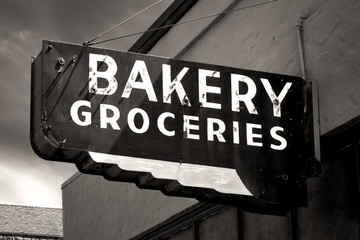 Black and White Worn Bakery and Groceries Sign