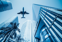 Airplane And Business Buildings