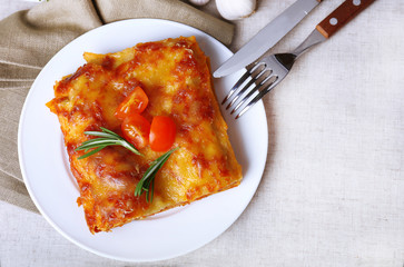 Sticker - Portion of tasty lasagna on table