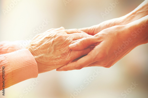 Fotomural Helping hands, care for the elderly concept