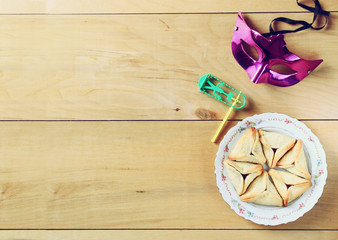 top view of Hamantaschen cookies or hamans ears and mask for Pur