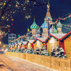 Wall Mural - Christmas balls on tree branches in Red square