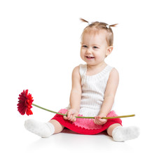 Adorable baby girl sitting with flower isolated