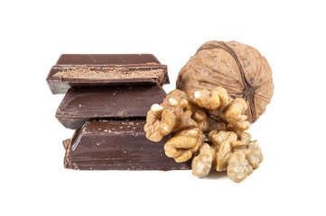Wall Mural - Chocolate pieces and walnuts on white background