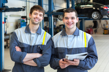 Two man mechanics working