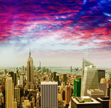 Fototapeta  - Awesome aerial view of Midtown Manhattan against sunset sky