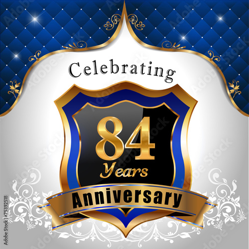 Poster celebrating 84 years anniversary, sheild with royal emblem