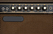 Close up of brown electric guitar amplifier