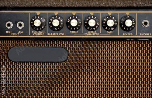 Fotomural Close up of brown electric guitar amplifier