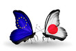 Two butterflies with flags EU and Japan