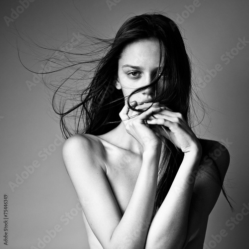 Naklejka - mata magnetyczna na lodówkę close-up portrait of a beautiful young girl with long hair. blac