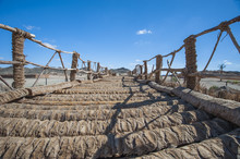 Wooden Rope Bridge In Remote Desert