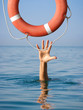 Lifebuoy for drowning man in sea or ocean water. Insurance