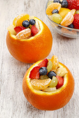 Canvas Print - Orange filled with fruit salad