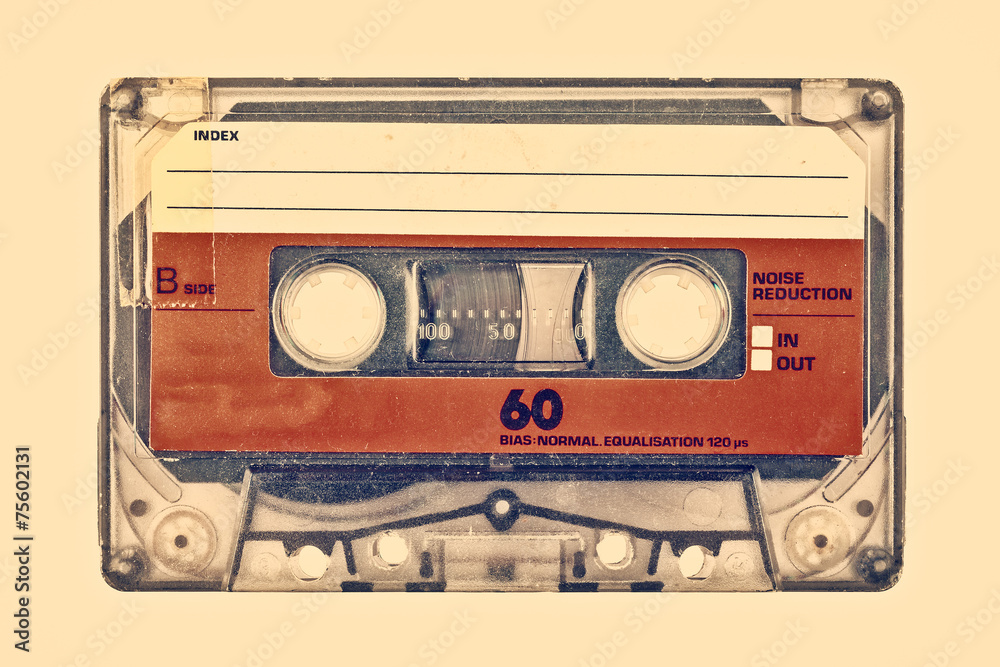 Retro styled image of an old compact cassette - obrazy, fototapety, plakaty 