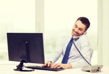 Wall Mural - smiling businessman or student with computer