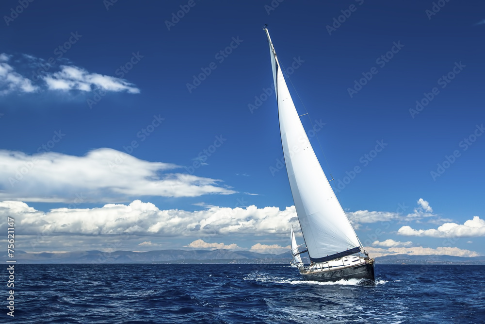 Ship yachts with white sails in the open Sea. Luxury boats. - obrazy, fototapety, plakaty 