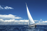 Fototapeta Sawanna - Ship yachts with white sails in the open Sea. Luxury boats.
