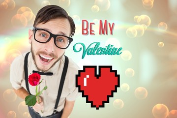 Poster - Composite image of geeky lovesick hipster holding rose
