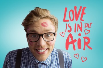 Aufkleber - Composite image of geeky hipster covered in kisses