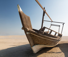 Fishermans Boat Or Dhow On Sand