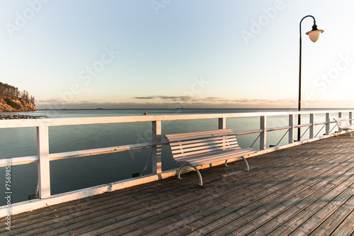 Naklejka na drzwi Beautiful colorful Sunrise on the pier at the seaside