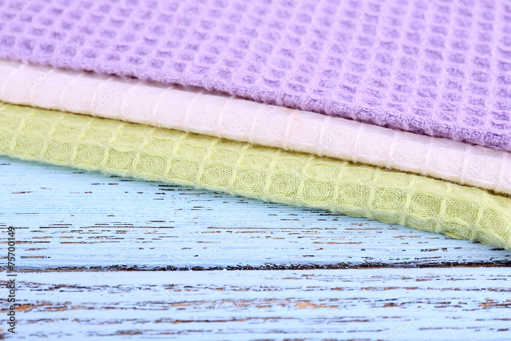 Colorful napkins on wooden table