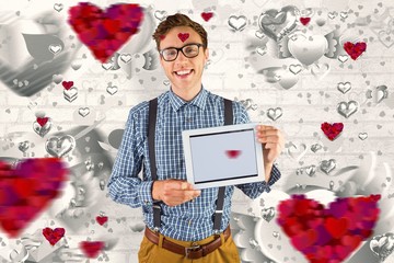 Poster - Composite image of geeky businessman showing his tablet pc
