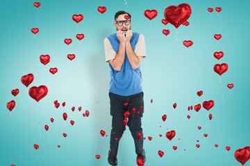 Leinwandbilder - Composite image of geeky hipster looking nervously at camera