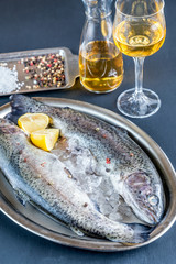 Sticker - Fresh trouts in ice on the vintage metal tray