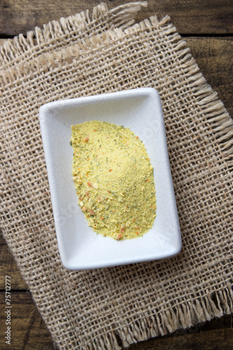 vegetables and spices dried condiment in a white bowl Poster