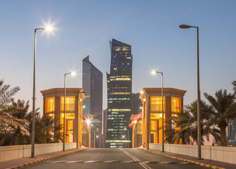 Fototapete - Architecture in Kuwait City illuminated at dusk