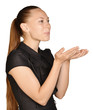 © mirexon - beautiful woman folded her hands together and blowing forward.