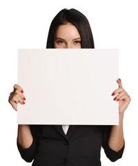 Wall Mural - Business woman holding in hand a blank sheet of white cardboard