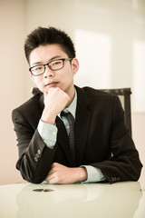 Wall Mural - Image of young handsome confident businessman in suit