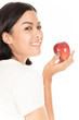 © Nonwarit - Smiling woman with apple isolated on white