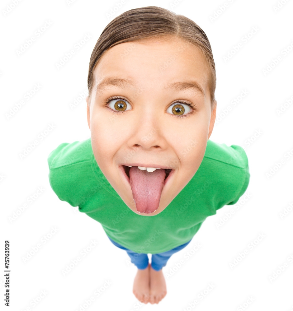 little girl tongue out Funny little girl sticking her tongue out の Stock フォト | Adobe Stock