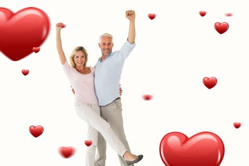 Poster - Composite image of smiling couple cheering at the camera
