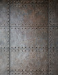 steel metal armour background with rivets