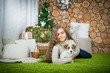 © NatBud - The girl is lying in the floor with the dog. Girl with dog.