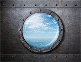 old ship rusty porthole or window with sea and horizon behind