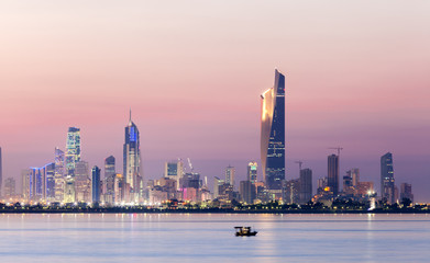 Fototapete - Skyline of Kuwait city at night, Middle East
