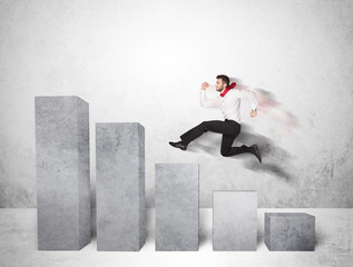 Wall Mural - Successful business man jumping over charts on background