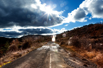 Wall Mural - road trip concept. mountain landscape and old road