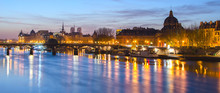 Seine River And Old Town Of Paris (France) At Night