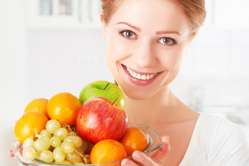 Wall Mural - happy girl and healthy vegetarian food, fruit