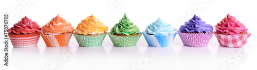 Fotografía Delicious cupcakes isolated on white