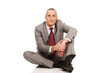 © Piotr Marcinski - Businessman sitting on the floor