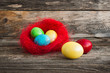 Easter eggs in red nest