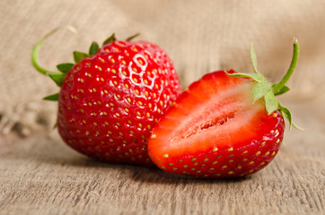 Two ripe strawberries on the table